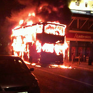 A photo reported to be from the scene in Tottenham depicts a bus fire.