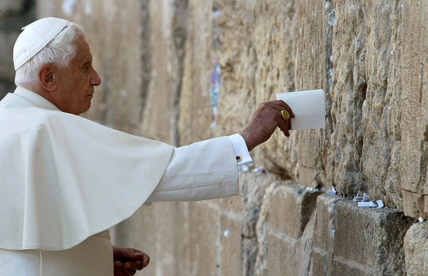 Pope Benedict XVI places a note   in the Western Wall, Judaism's holiest prayer site, in Jerusalem's Old   City May 12, 2009.
